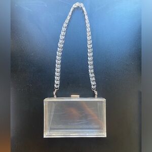 Hard shell clear bag with interchangeable straps